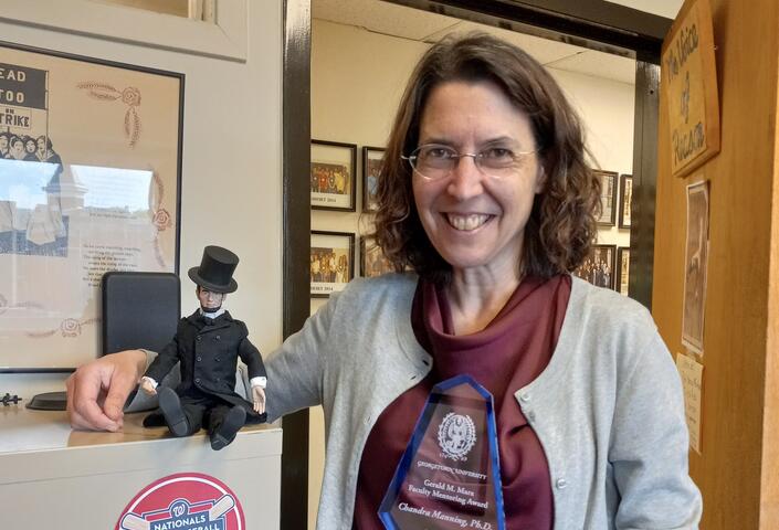 Now a Professor of History at Georgetown University, Manning has won both the Dean’s Award for Excellence in Undergraduate Teaching and the Graduate School of Arts and Sciences Award for Graduate Student Mentoring, shown here. 