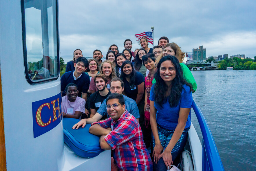 Student leaders smiling on boat cruise on Charles river