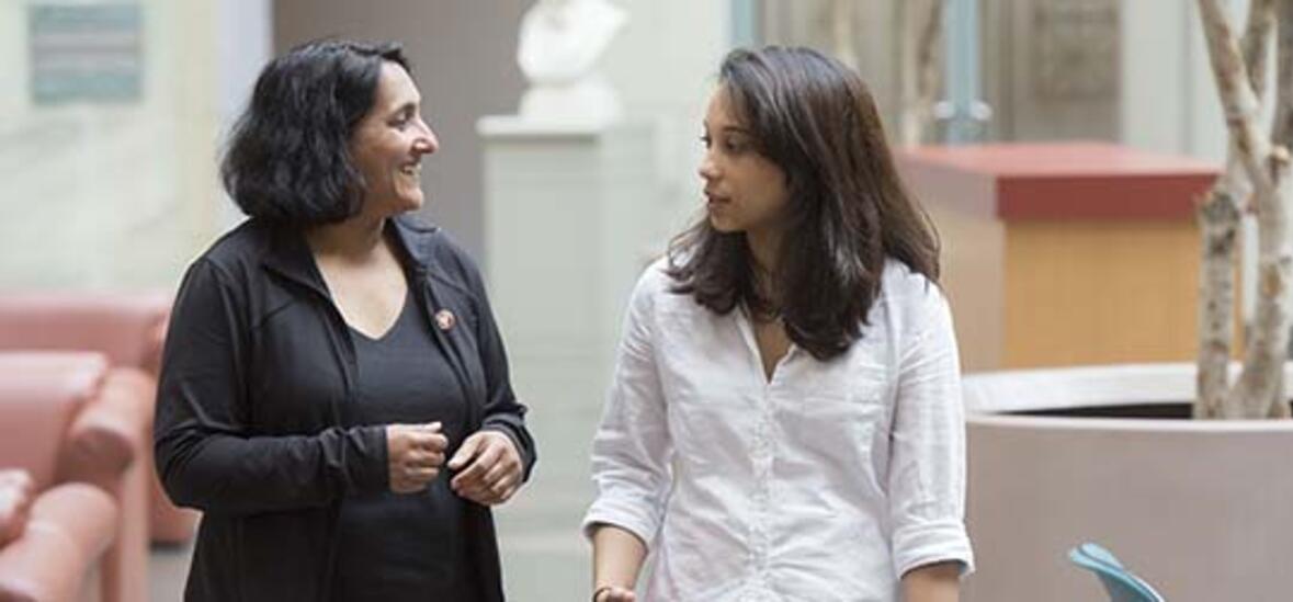 Sheila Thomas and Rosaria Fernandez walking at Harvard Medical School