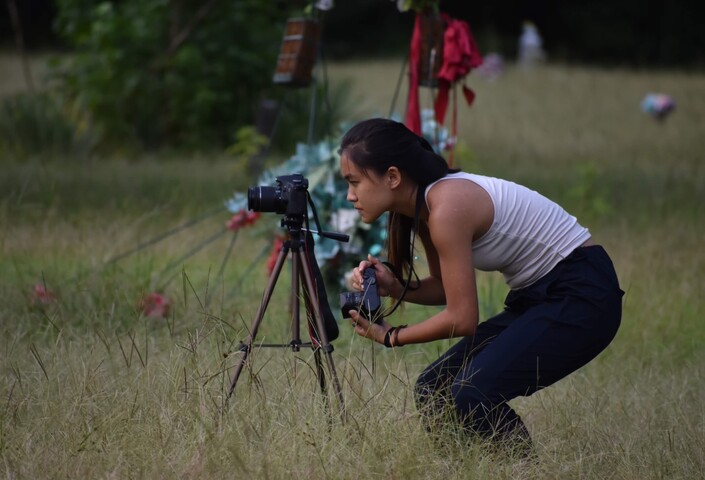 Eana Xuyi Meng slouches to film
