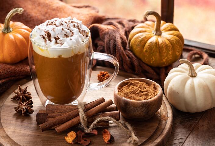 Hot cocoa with pumpkins and fall atmosphere