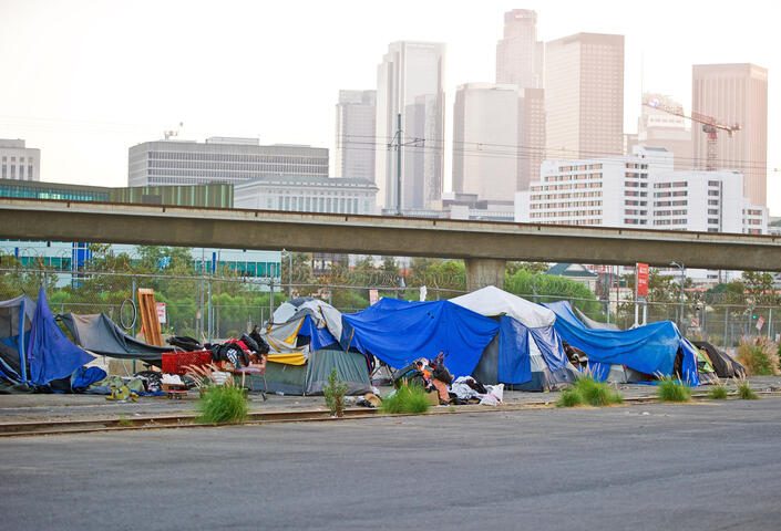 Homeless encampment along the roadside depicting the growing epidemic of homelessness in the City of Los Angeles. Los Angeles, California USA