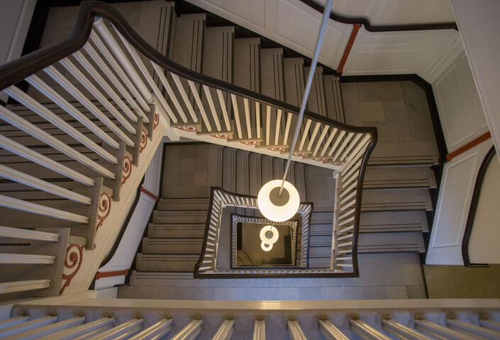 Looking down from top of staircase winding upward