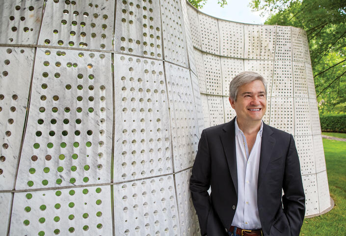 Stephen Ansolabehere standing in front of cement wall