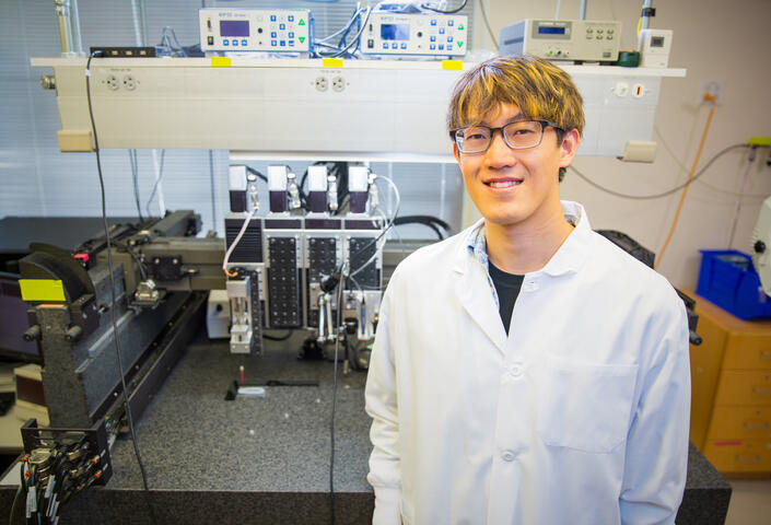 Aric Lu with 3D printer