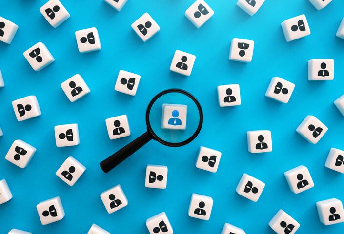 image of illustrations of persons with magnifying glass