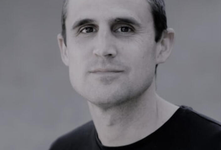 Black and white head shot of Paul Niehaus, PhD '09