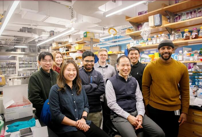 Brian Liau (front center) with his team in the Converse Laboratories. From left: Megan Yeo, Hui Si Kwok, Amanda Waterbury, Irtiza Iram, Stefan Harry, Liau, Nicholas Chen, and Idris Barakat.