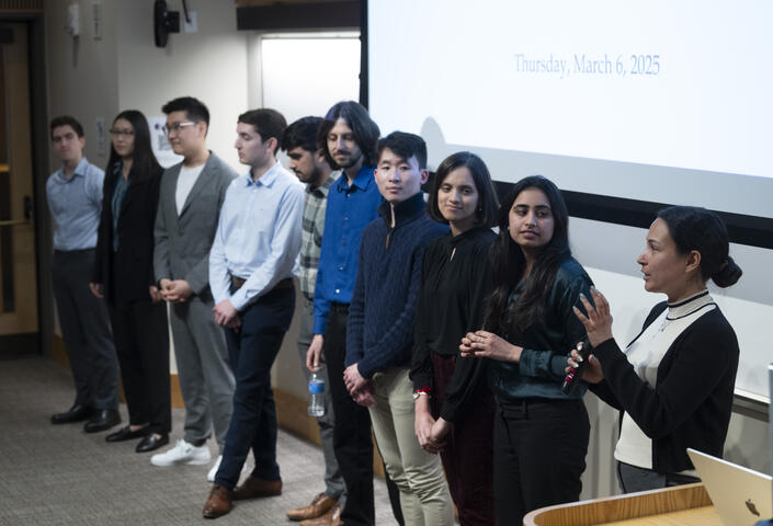 the ten participants standing in a line during the Q&A session