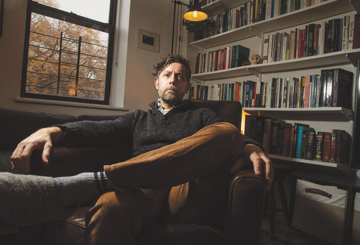 Ben Dunning sitting on chair