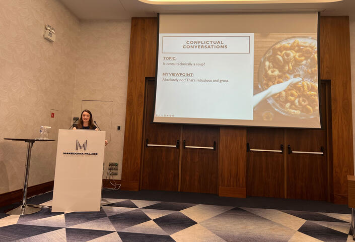 Hanne Collins at a podium