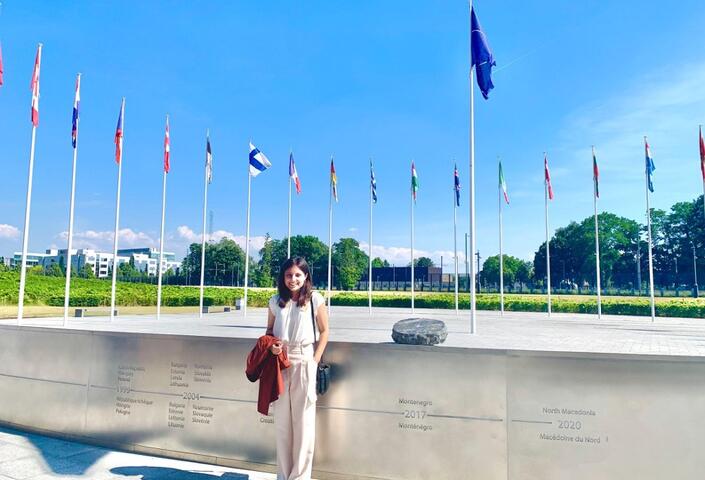Katherine Irajpanah in front of NATO headquarter
