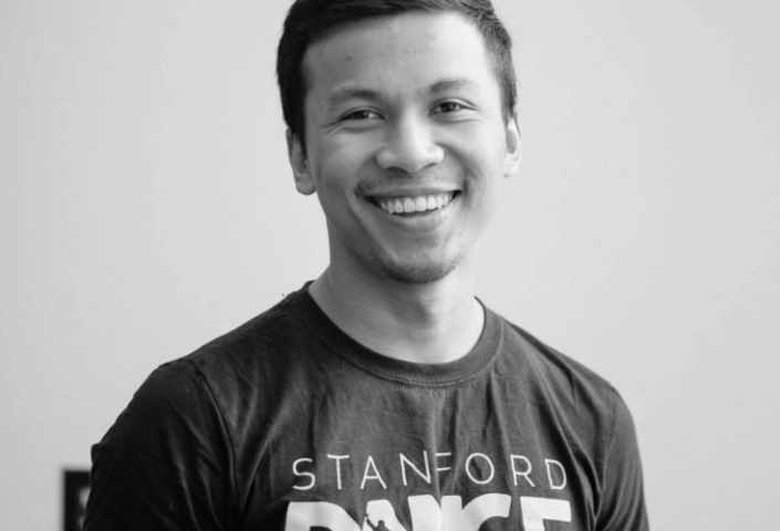 Black and white photo of graduating student Nghia Nguyen.