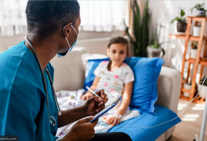 Pediatric nurse speaking with child