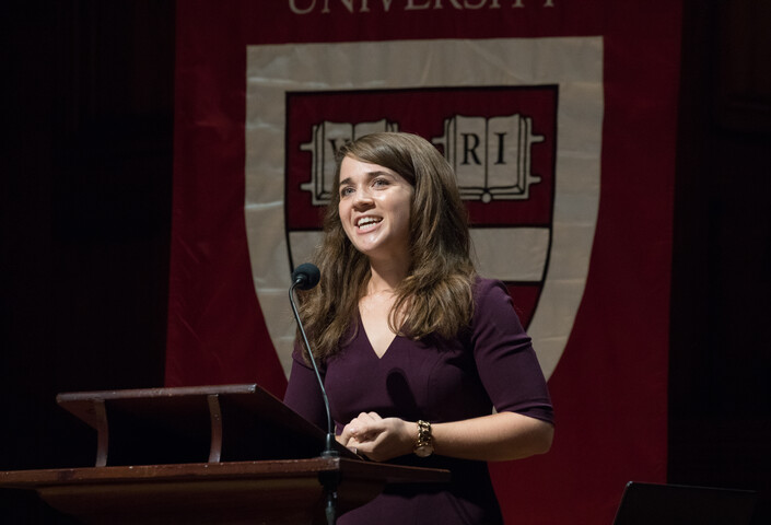 Blakely Bussie O'Connor speaking at a podium