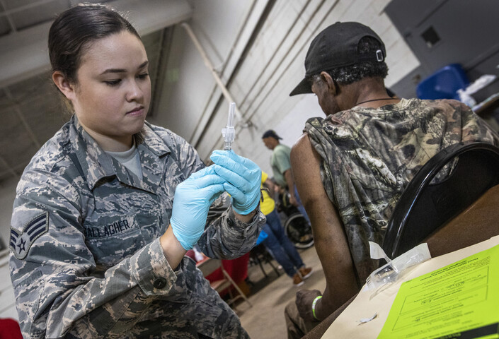 National Guard medic preparing a flu shot 