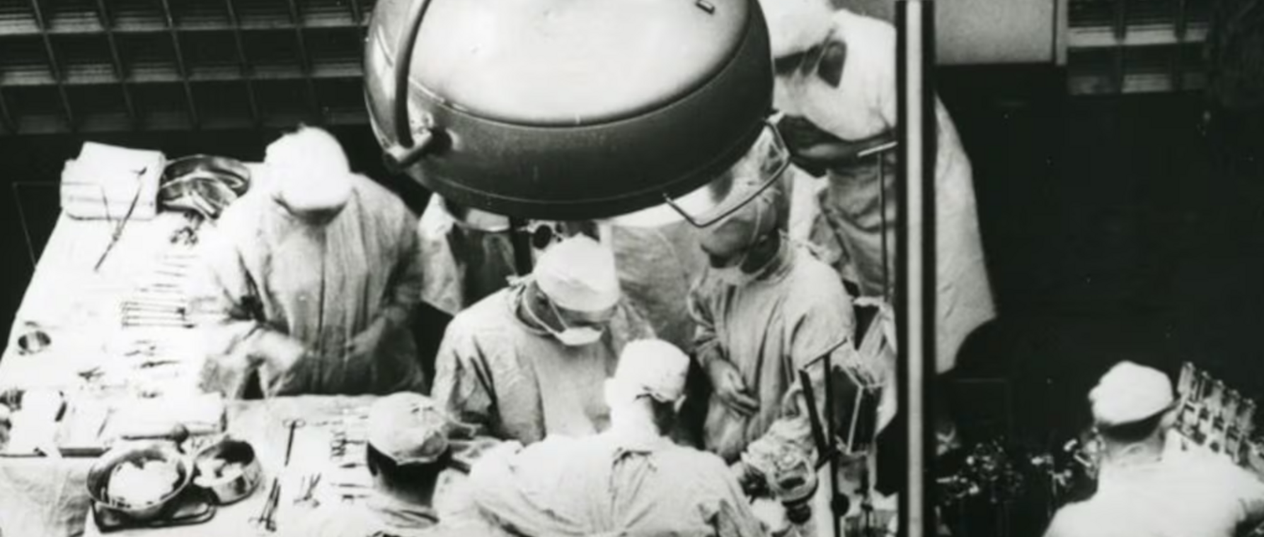 Dr. Joseph E. Murray, at center facing camera, is seen performing the first successful organ transplant on Dec. 23, 1954, at Peter Bent Brigham Hospital in Boston.