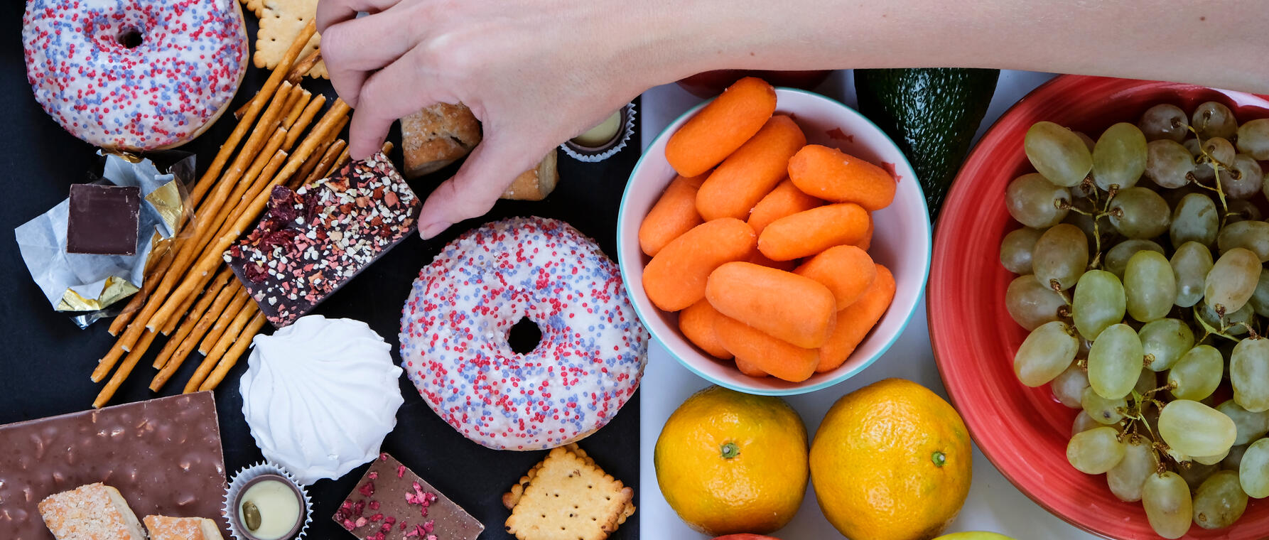 Food tray with hand over it