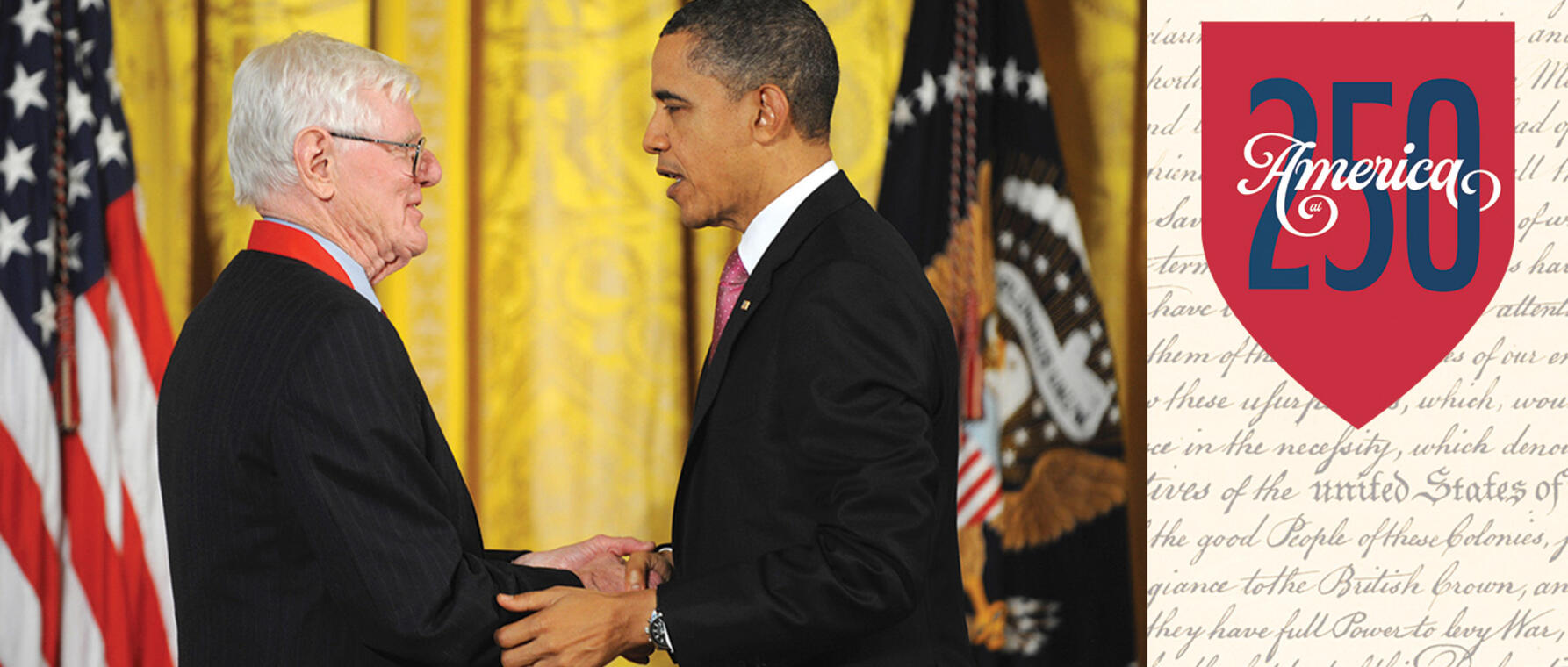 Wood and Obama shaking hands; 250th logo on top of shield shape sitting over the Declaration of Independence
