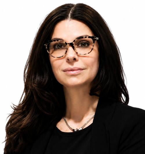 headshot of Jill Becker, woman with glasses and long brown hair
