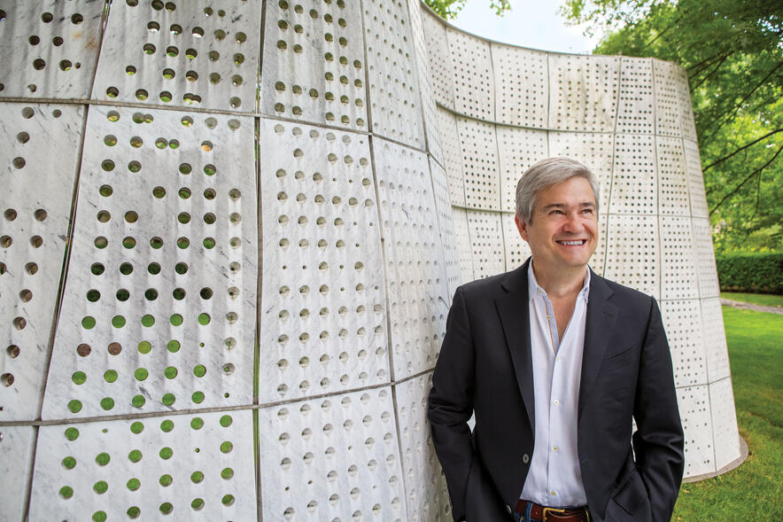 Stephen Ansolabehere standing in front of cement wall