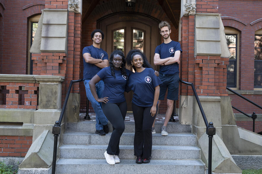 Perkins Hall resident advisors standing on steps
