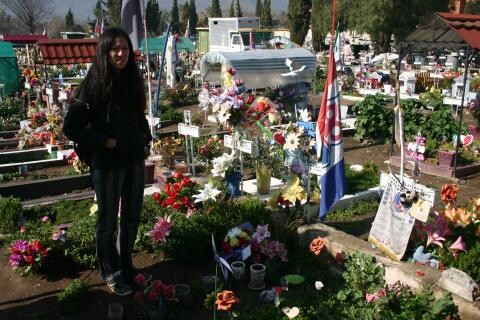 Clara Han standing in a cemetary