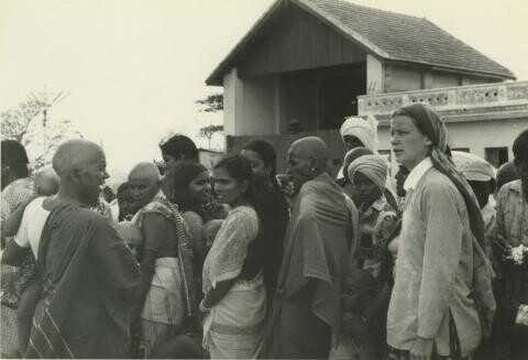 Black and white photo of crowd of people 
