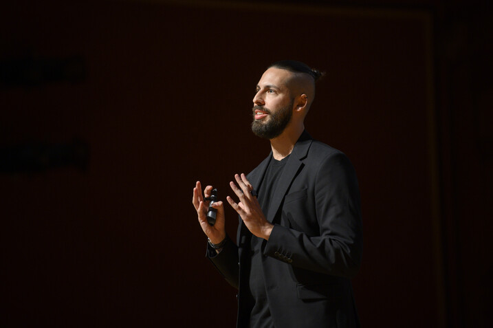 Emilio Vavarella on stage at Harvard Horizons symposium on April 11, 2023