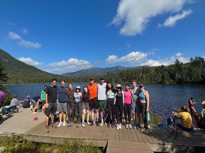 Chen (center right) with members of her economics PhD cohort during a recent trip to New Hampshire's White Mountains. 