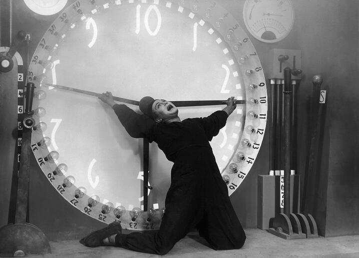 Freder, the privileged son of the master of Metropolis, appears to be crucified on a clock as he tries to stop it.