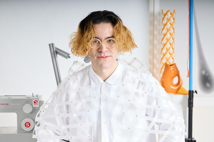 Horizons Scholar Noah Toyonaga wearing a garment based on his explorations of the scissors motif