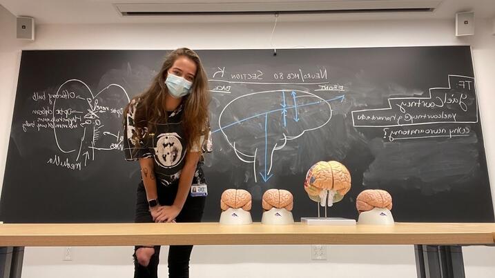 Courtney in the MCB80/Neurobiology of Behavior course classroom where she was a teaching fellow