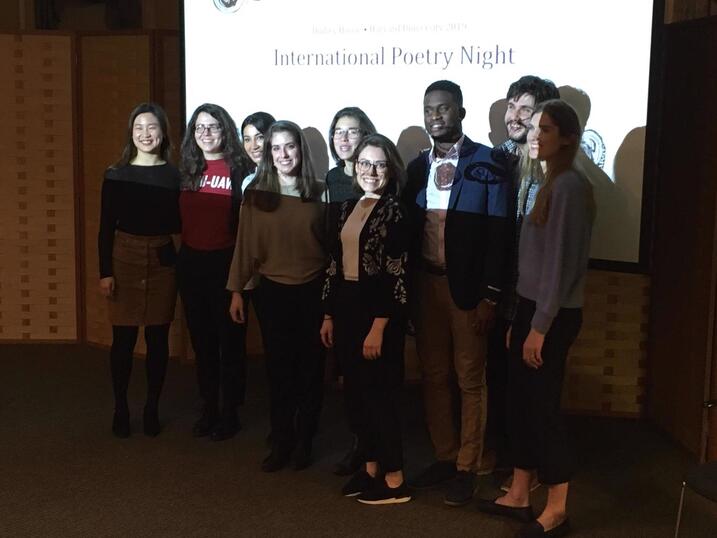 During International Poetry Night, students read poems in their native languages as the literary fellows provide English translations.