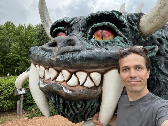 Lowell Brower poses in Rhinelander, WI, with Wisconsin's favorite supernatural cryptid, the Hodag.