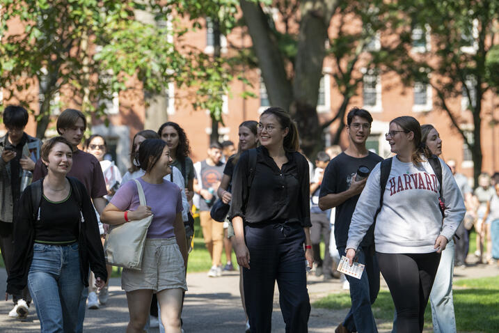 Students walking in Harvard Yard