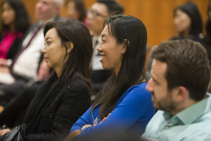 Alumni watching a presentation