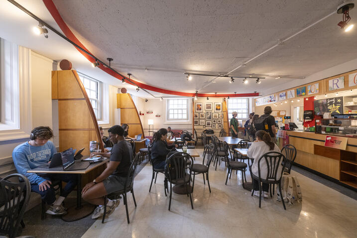 Students study inside Cafe Gato Rojo