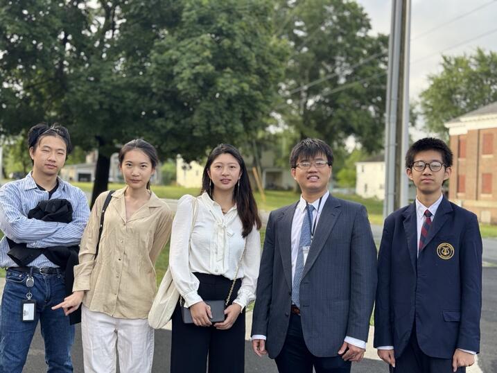 Cao with fellow lab mates