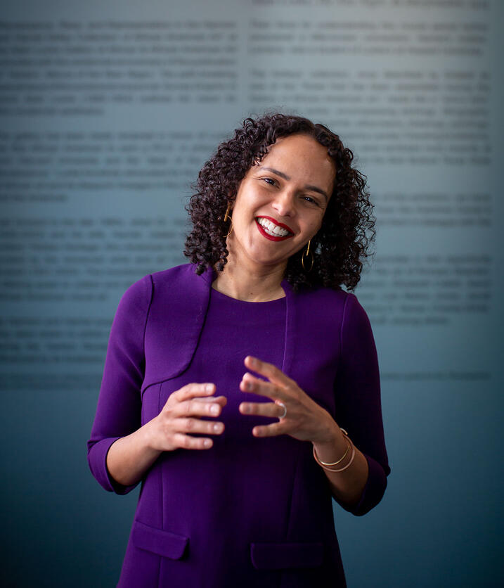 Cecile Fromont smiling with hands moving in front of her