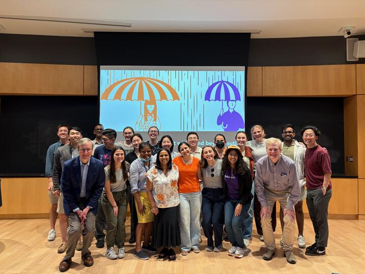 Photo of Maya after her defense with advisors and Harvard classmates
