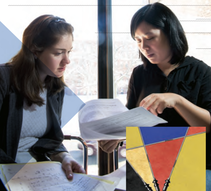 two people working together