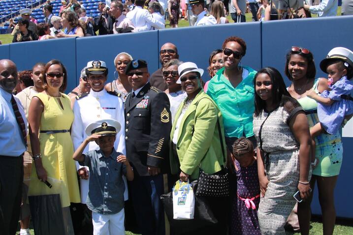 Berry with friends and family at Naval graduation