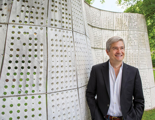 Stephen Ansolabehere standing in front of cement wall