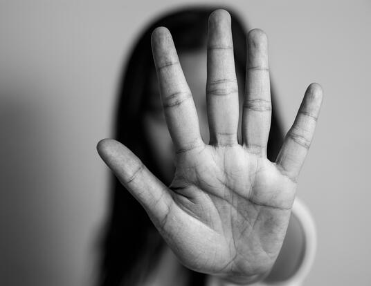 Hand in front of face