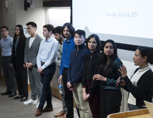 the ten participants standing in a line during the Q&A session