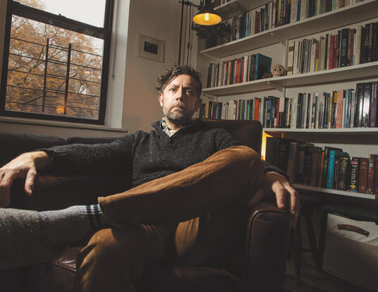 Ben Dunning sitting on chair