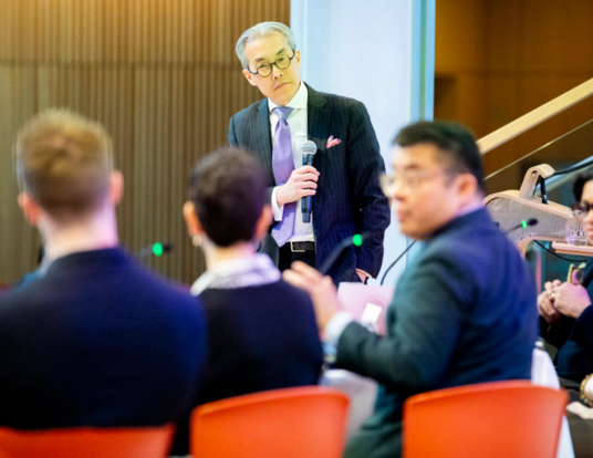 Harvard Business School’s Nien-hê Hsieh (standing) posed a hypothetical to the panel.