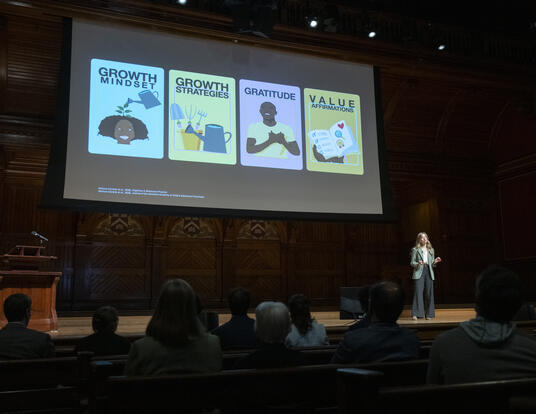 Katherine Venturo-Conerly speaking onstage at the 2025 Harvard Horizons Symposium