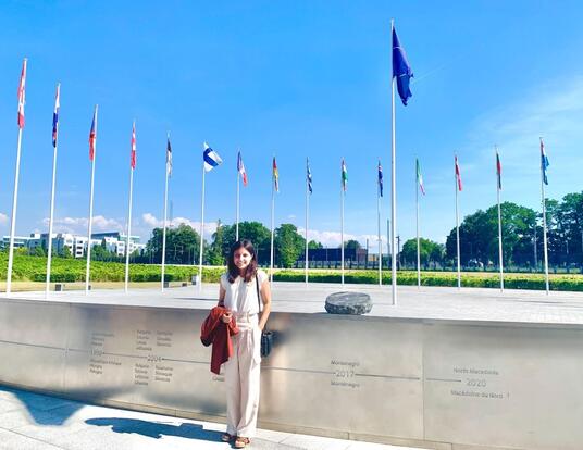 Katherine Irajpanah in front of NATO headquarter